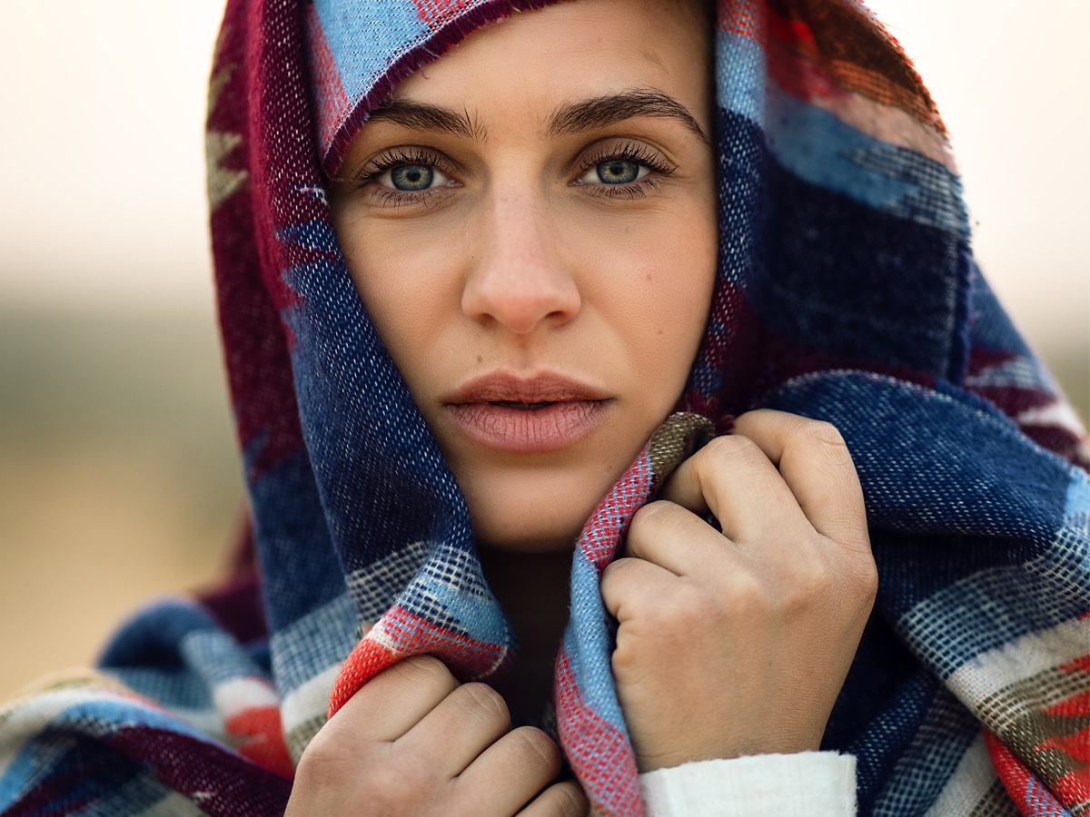 Woman holding hijab.